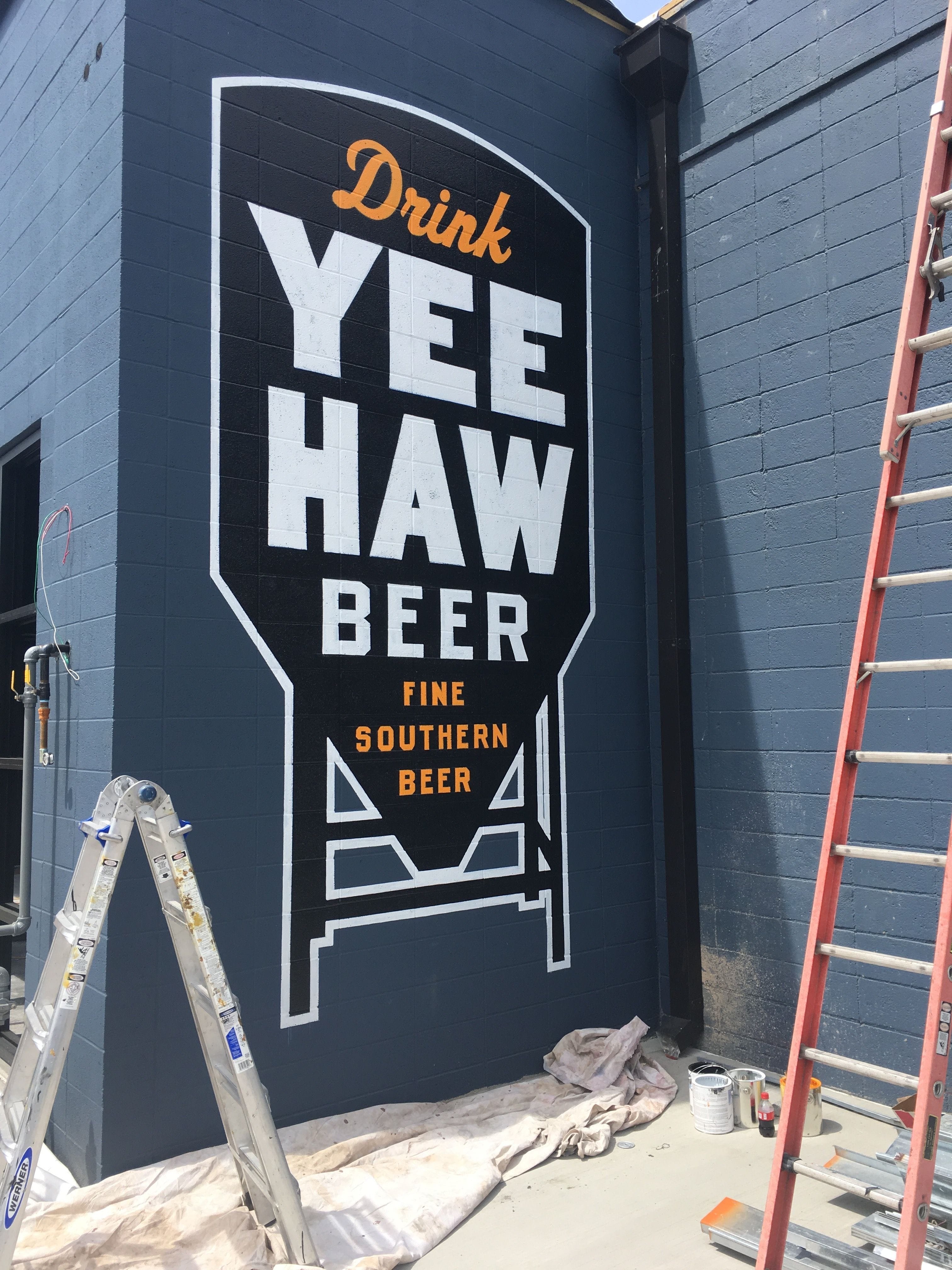 Yee Haw Brewing Silo logo hand painted and lettered on exterior of Yee Haw Brewing located in Johnson City, TN